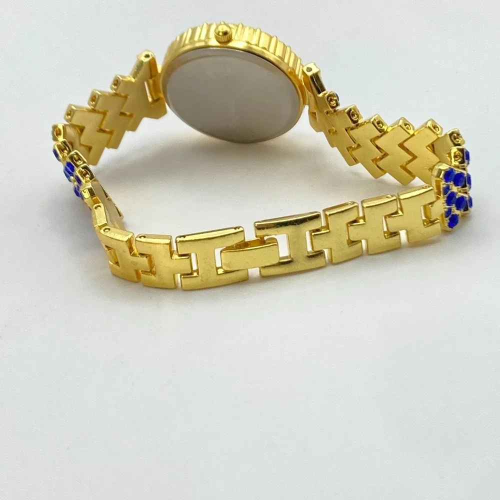 Modern Women's Watch 29mm Gold Tone Blue Crystals Bling Round New Battery 7.25